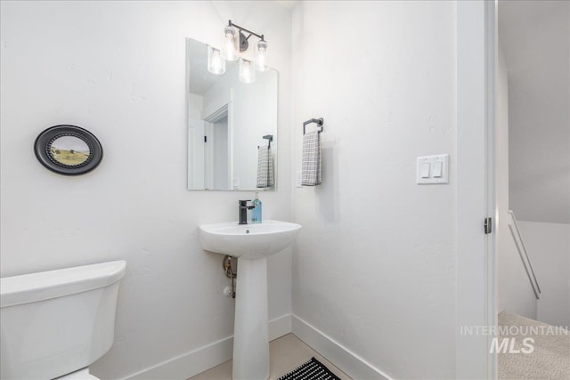 11328 W Campanula Dr, Star, ID 83669 - bathroom with toilet and baseboards