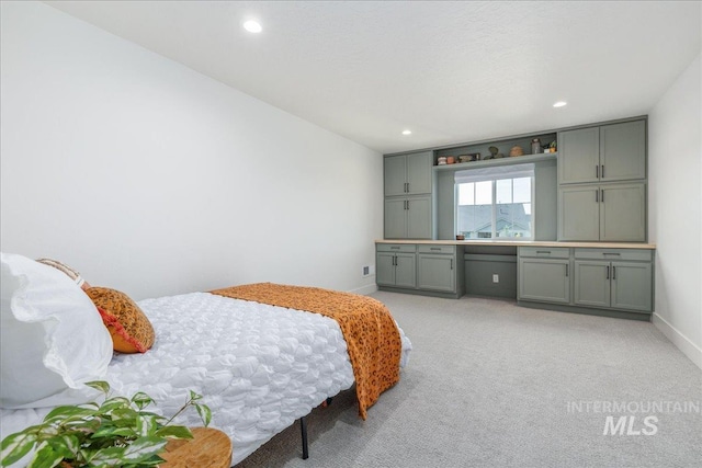 11328 W Campanula Dr, Star, ID 83669 - bedroom featuring baseboards, recessed lighting, and light carpet