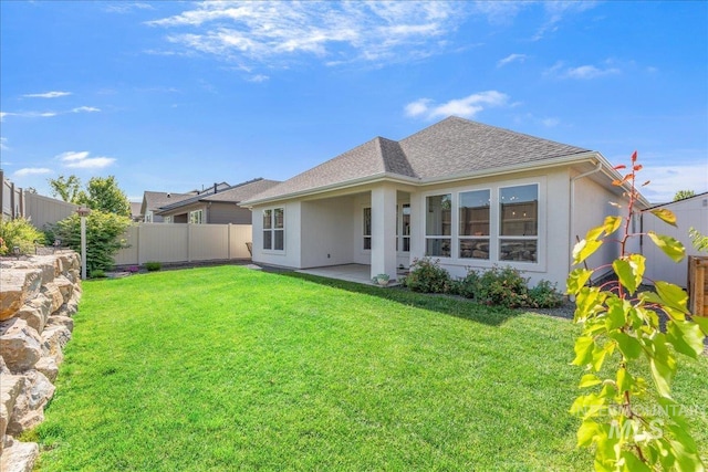 11328 W Campanula Dr, Star, ID 83669 - rear view of house with stucco siding, a shingled roof, and a patio area