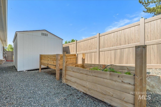 11328 W Campanula Dr, Star, ID 83669 - fenced backyard with a vegetable garden