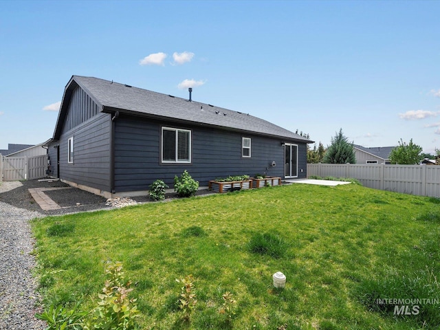 rear view of property with a patio area