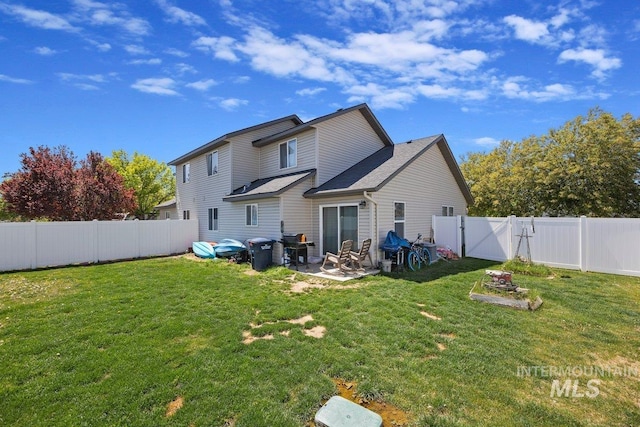 909 Arrow Wood Ct, Twin Falls, ID 83301 - back of house featuring a patio and a gate