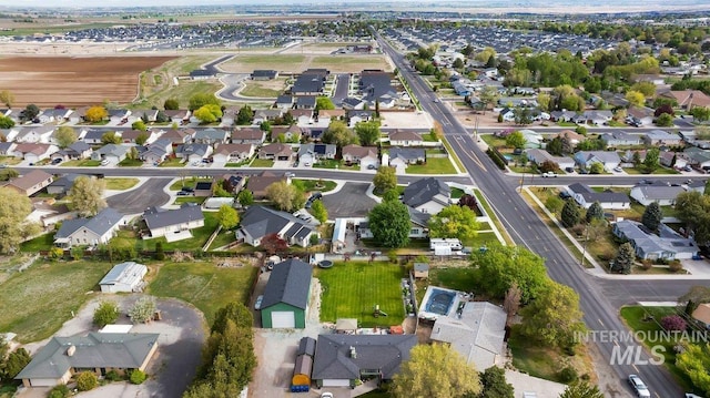 909 Arrow Wood Ct, Twin Falls, ID 83301 - aerial view of property and surrounding area featuring nearby suburban area