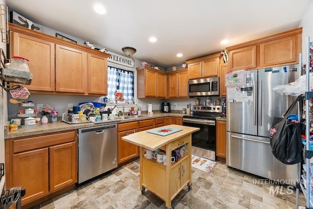 909 Arrow Wood Ct, Twin Falls, ID 83301 - kitchen featuring stainless steel appliances, wooden counters, a sink, recessed lighting, and stone finish floors
