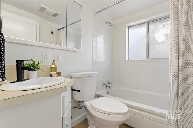 1223 N Mckinney St, Boise, ID 83704 - bathroom with toilet, visible vents, shower / bath combo, and vanity