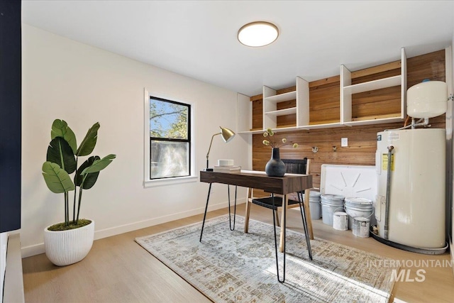1223 N Mckinney St, Boise, ID 83704 - office space with water heater, baseboards, and wood finished floors