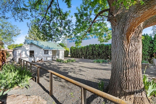 1223 N Mckinney St, Boise, ID 83704 - view of yard with fence and an outdoor structure