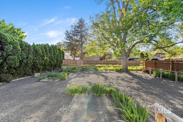 1223 N Mckinney St, Boise, ID 83704 - view of yard with a fenced backyard