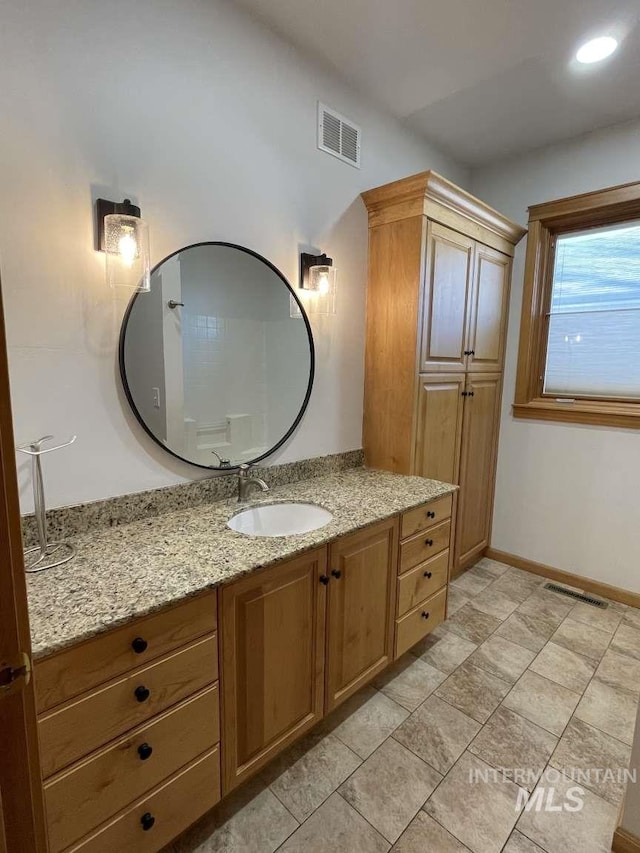 bathroom featuring vanity