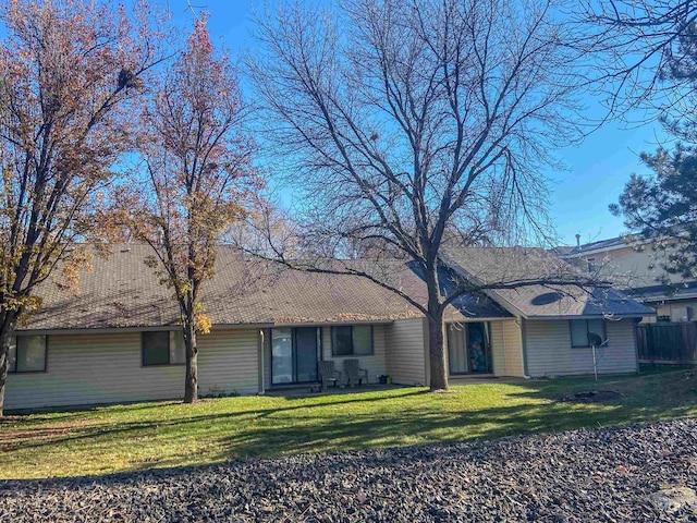 view of front of home with a front lawn