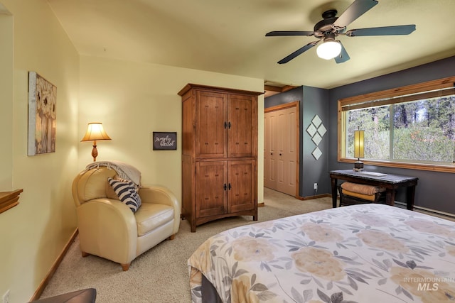 141 Stibnite St Unit 15, Mccall, ID 83638 - bedroom with light carpet, baseboards, a closet, and ceiling fan