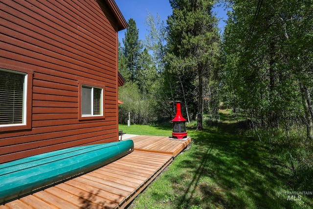 141 Stibnite St Unit 15, Mccall, ID 83638 - wooden terrace featuring a lawn