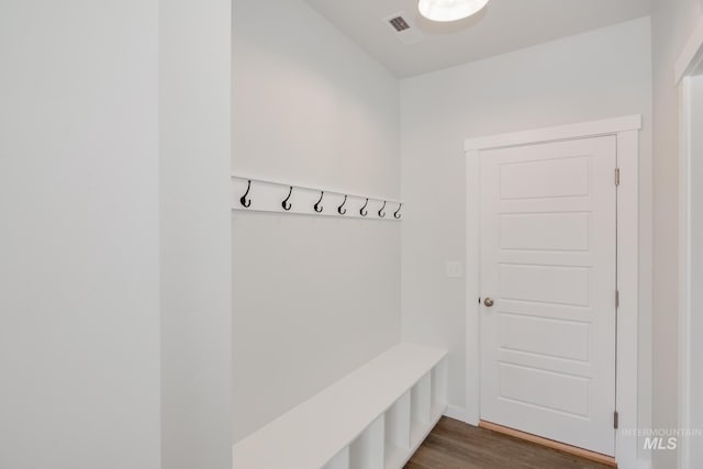 mudroom with visible vents and dark wood-style flooring