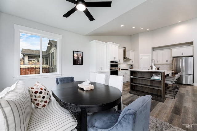20513 N Glenisla Ave, Boise, ID 83714 - dining area featuring dark wood-type flooring, ceiling fan, vaulted ceiling, and recessed lighting