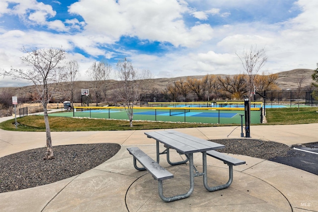 20513 N Glenisla Ave, Boise, ID 83714 - view of property's community with a tennis court, community basketball court, fence, and a mountain view