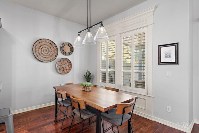 1814 E Grand Canyon Dr, Meridian, ID 83646 - dining room with baseboards and dark wood-type flooring