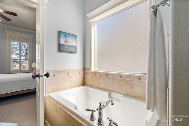 1814 E Grand Canyon Dr, Meridian, ID 83646 - ensuite bathroom with connected bathroom, a ceiling fan, crown molding, and a garden tub