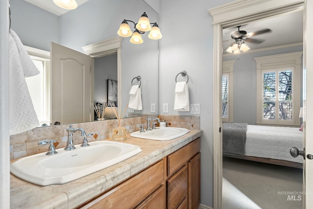 1814 E Grand Canyon Dr, Meridian, ID 83646 - bathroom featuring connected bathroom, a wealth of natural light, and a sink