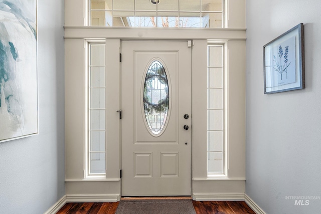 1814 E Grand Canyon Dr, Meridian, ID 83646 - foyer with dark wood-style flooring and baseboards