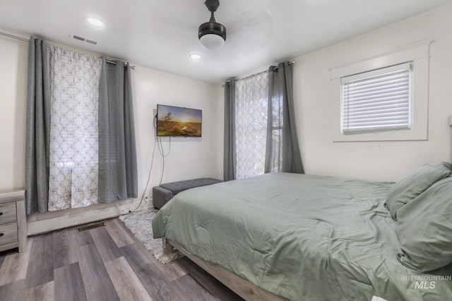 317 W C, Shoshone, ID 83352 - bedroom featuring ceiling fan, visible vents, and wood finished floors