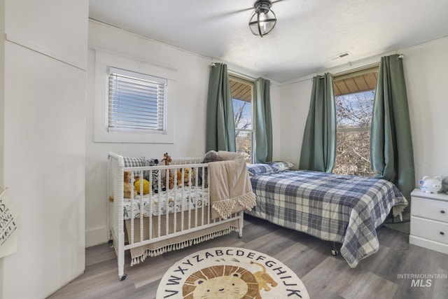 317 W C, Shoshone, ID 83352 - bedroom with wood finished floors and visible vents