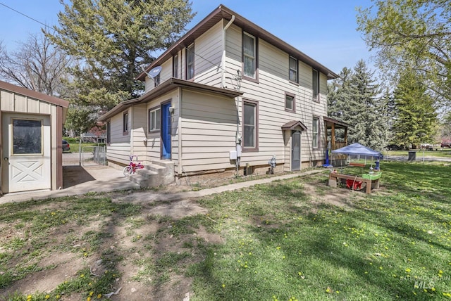 317 W C, Shoshone, ID 83352 - view of property exterior featuring entry steps and a yard