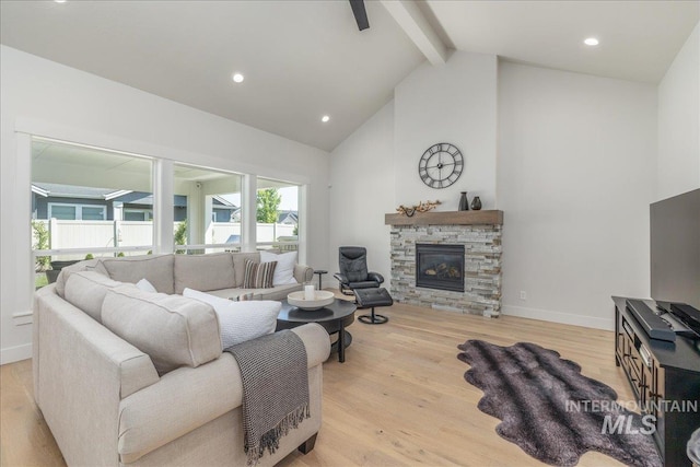 11304 W Helenium Dr, Star, ID 83669 - living room featuring beam ceiling, wood finished floors, a fireplace, high vaulted ceiling, and recessed lighting