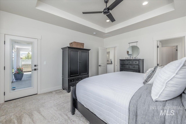 11304 W Helenium Dr, Star, ID 83669 - bedroom with a tray ceiling, light colored carpet, recessed lighting, and a ceiling fan