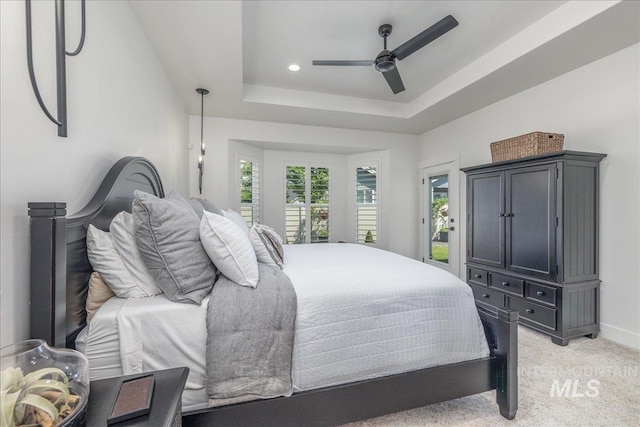11304 W Helenium Dr, Star, ID 83669 - bedroom with a tray ceiling, light colored carpet, a ceiling fan, access to exterior, and recessed lighting