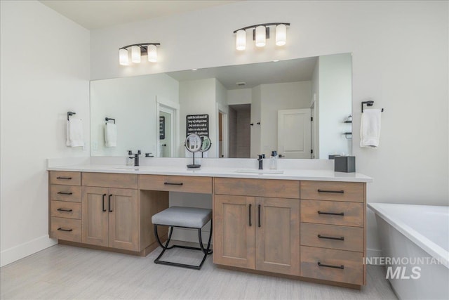 11304 W Helenium Dr, Star, ID 83669 - bathroom with a soaking tub, double vanity, and wood finished floors
