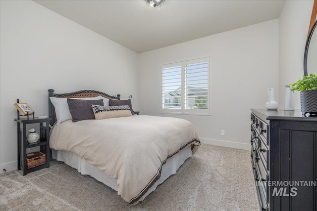 11304 W Helenium Dr, Star, ID 83669 - bedroom featuring light carpet and baseboards