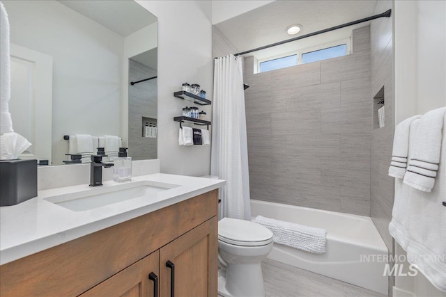 11304 W Helenium Dr, Star, ID 83669 - bathroom featuring vanity and shower / bathtub combination with curtain