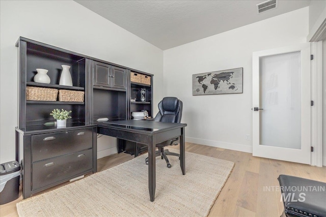 11304 W Helenium Dr, Star, ID 83669 - office area featuring light wood-style floors and baseboards