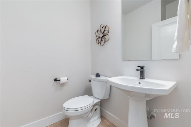 11304 W Helenium Dr, Star, ID 83669 - bathroom featuring toilet and wood finished floors