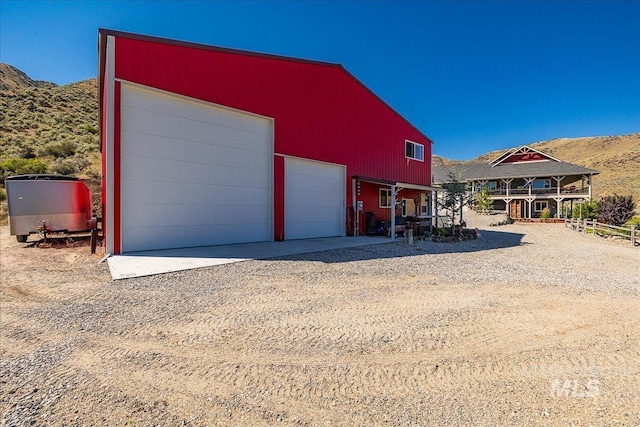 garage featuring a mountain view