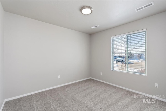 view of carpeted spare room