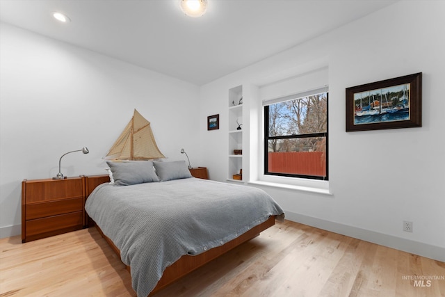 bedroom featuring light hardwood / wood-style floors