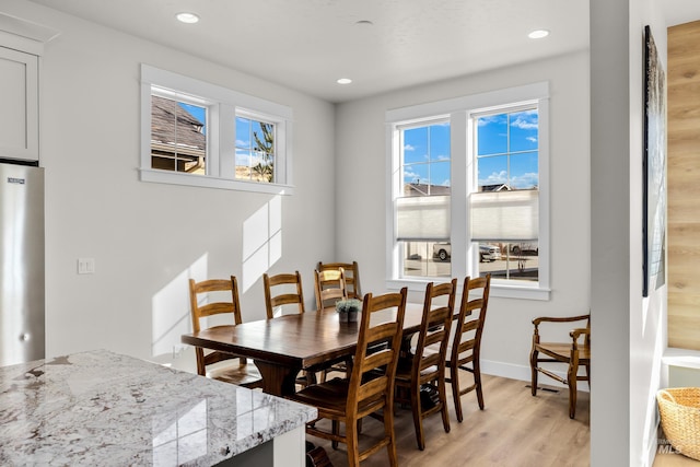 11645 N 24th Ave, Boise, ID 83714 - dining area featuring light wood-style floors, baseboards, a healthy amount of sunlight, and recessed lighting