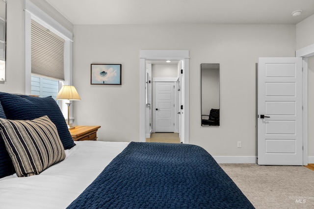 11645 N 24th Ave, Boise, ID 83714 - bedroom with baseboards and light colored carpet