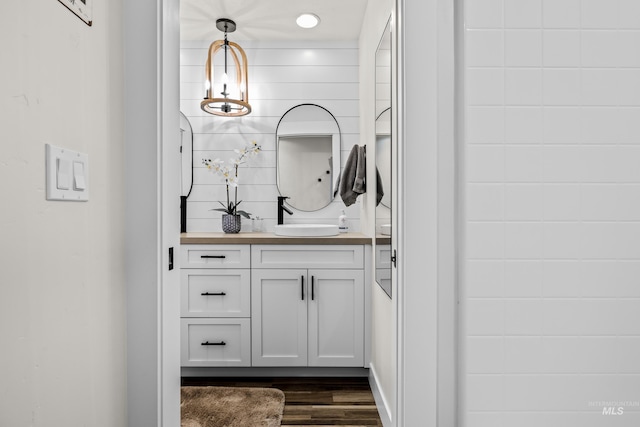 11645 N 24th Ave, Boise, ID 83714 - bathroom featuring vanity and wood finished floors