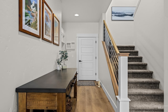11645 N 24th Ave, Boise, ID 83714 - interior space with baseboards, stairs, wood finished floors, and recessed lighting