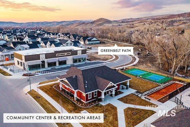 11645 N 24th Ave, Boise, ID 83714 - aerial view at dusk with a mountain view and a residential view