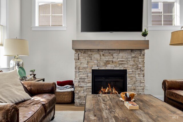 11645 N 24th Ave, Boise, ID 83714 - living area with a fireplace