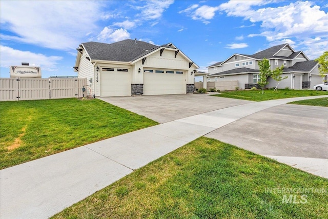 view of front of house featuring a gate, board and batten siding, concrete driveway, a front yard, and a garage