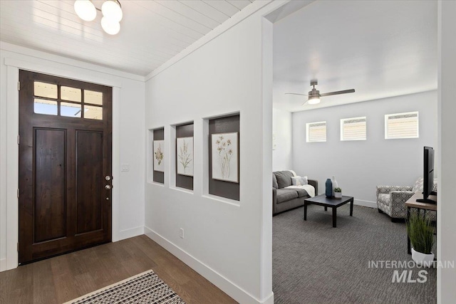 2895 Evening Sun Dr, Twin Falls, ID 83301 - entrance foyer with baseboards, a ceiling fan, dark wood-type flooring, and ornamental molding