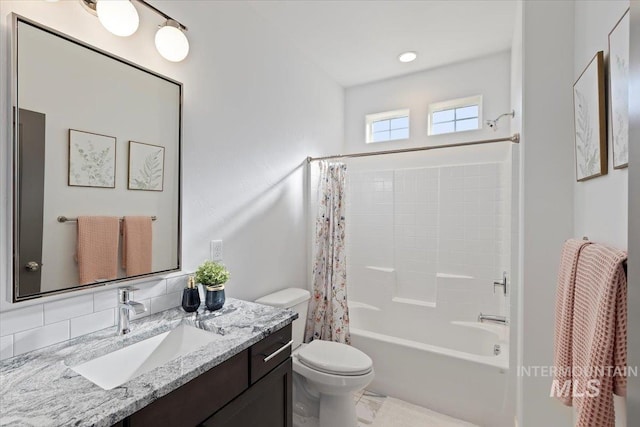 2895 Evening Sun Dr, Twin Falls, ID 83301 - bathroom with toilet, shower / bath combo with shower curtain, vanity, and backsplash