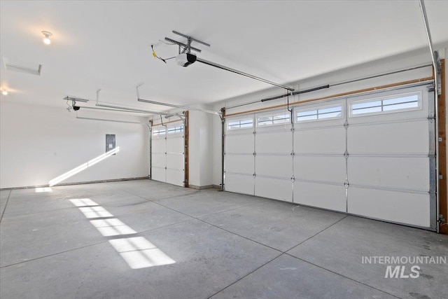 2895 Evening Sun Dr, Twin Falls, ID 83301 - garage with a garage door opener and electric panel