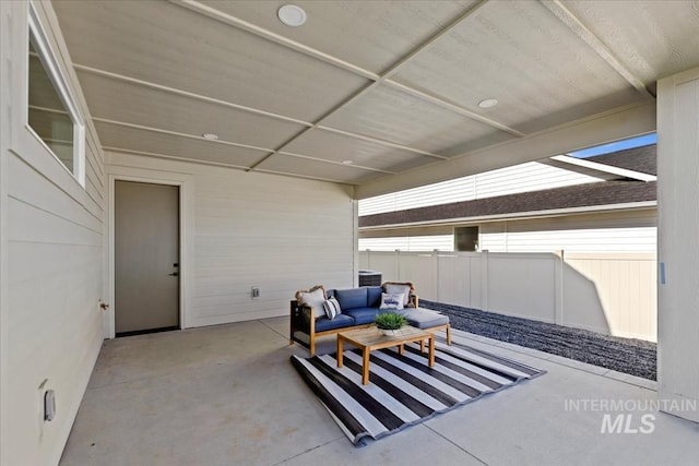 view of patio / terrace with fence and an outdoor hangout area