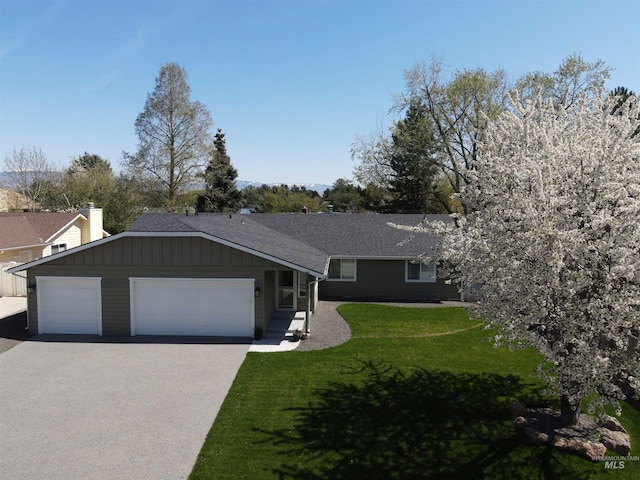 659 N Palmetto Dr, Eagle, ID 83616 - ranch-style house with a garage, driveway, and a front yard
