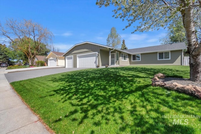 659 N Palmetto Dr, Eagle, ID 83616 - ranch-style house with a front lawn, driveway, and an attached garage